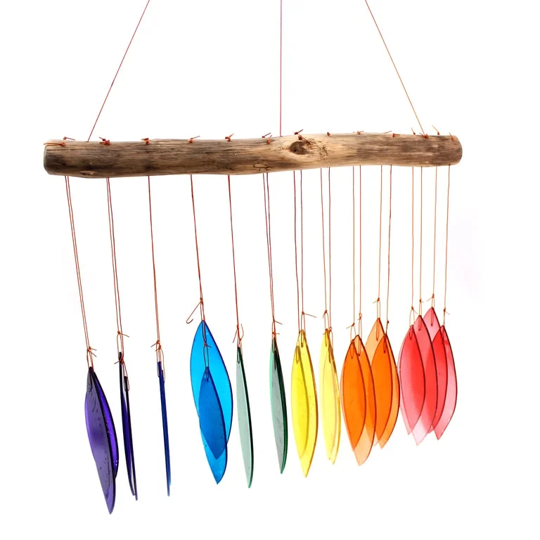 Assorted rainbow glass chimes in bright colours as decorative garden items.
