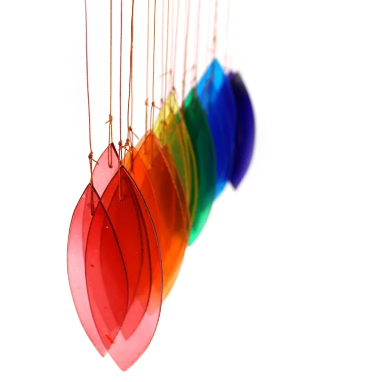 Rainbow glass outdoor chime set with coloured glass bells hanging on a decorative wire.