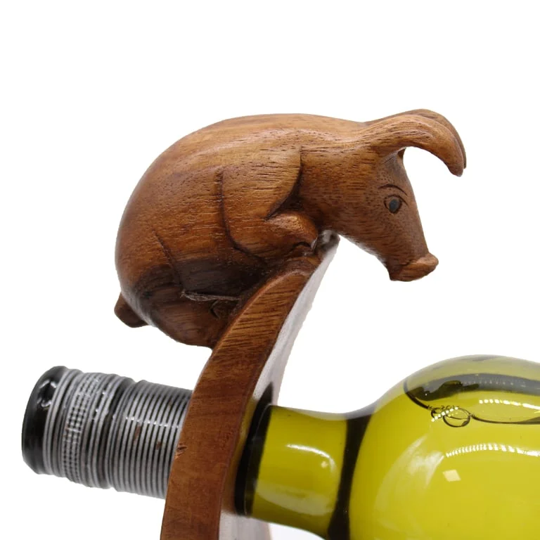 Pig wine holder, balanced design for safe wine bottle storage.