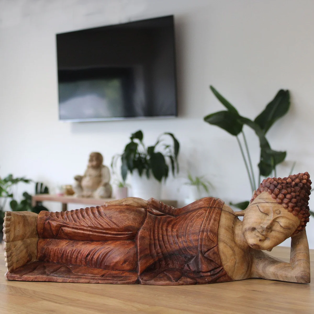 Sleeping Buddha ornament measuring 50cm, depicting a reclining Buddha figure in a peaceful pose