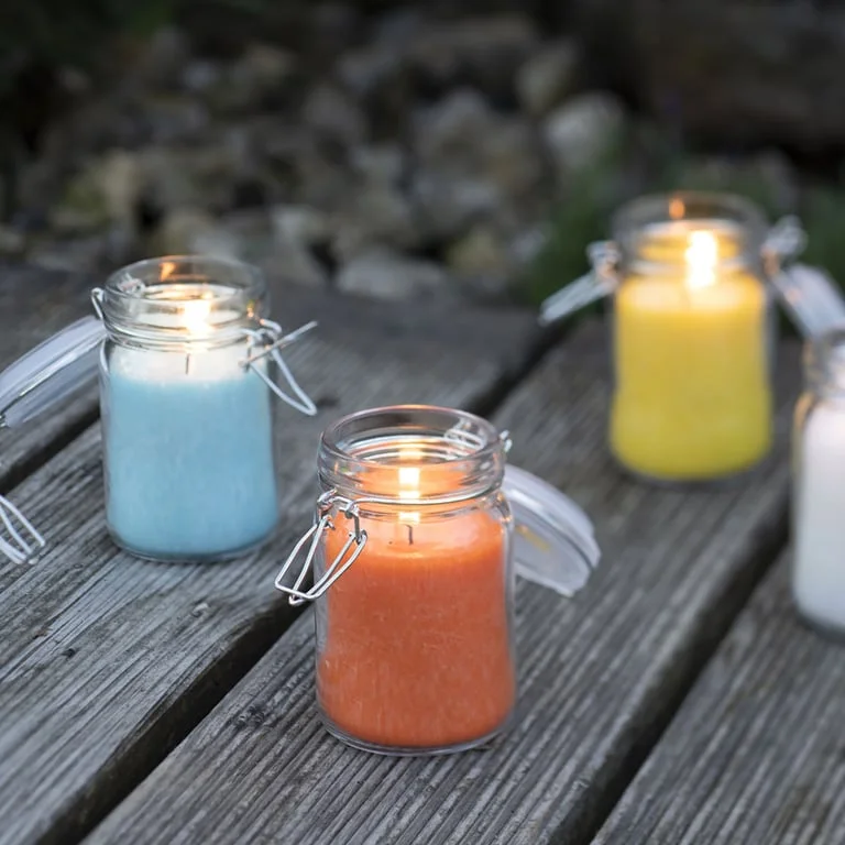 Turquoise jar candle made from olive wax, 120x70 mm, displayed in ceramic container