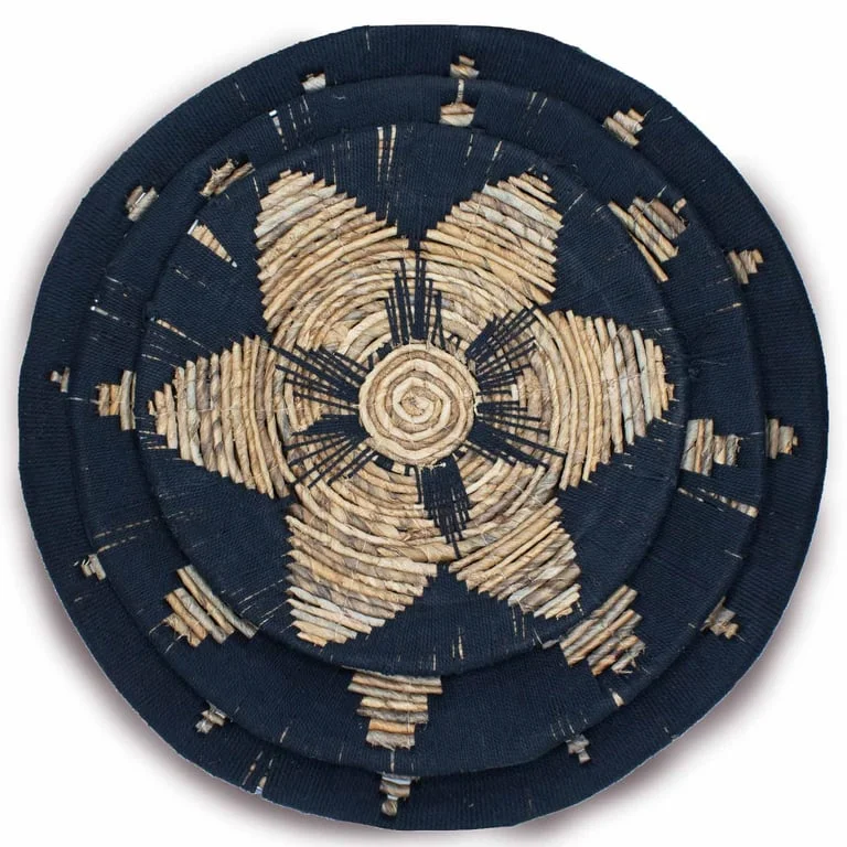 Three black seagrass bowls displayed as wall art set, arranged in a trio