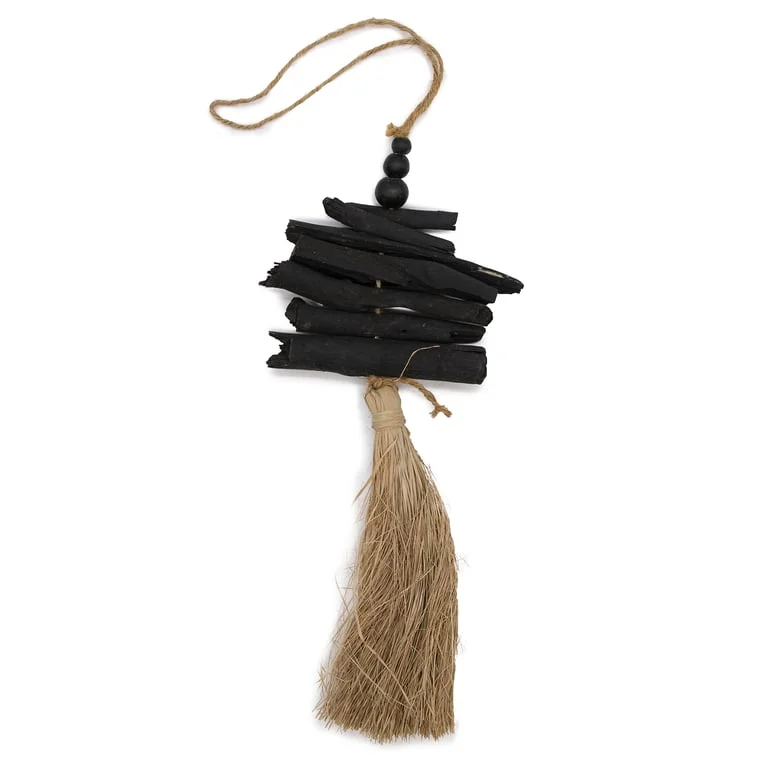 Sleek driftwood tassel hanging from a curved thread, 42 cm long