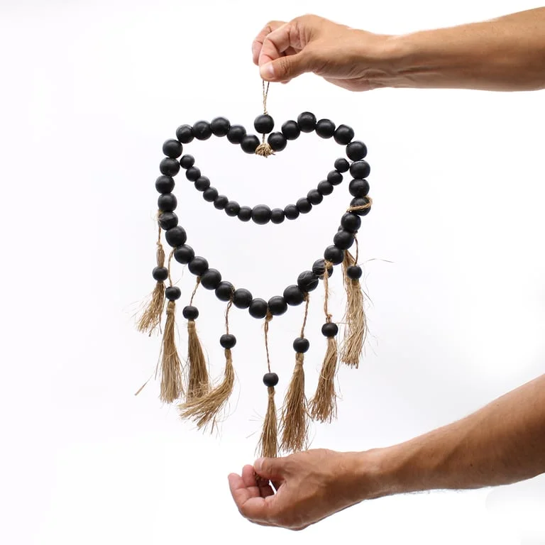 Large beaded heart-shaped wall hanging measuring 33x23 cm, featuring colorful beads arranged in a heart pattern.