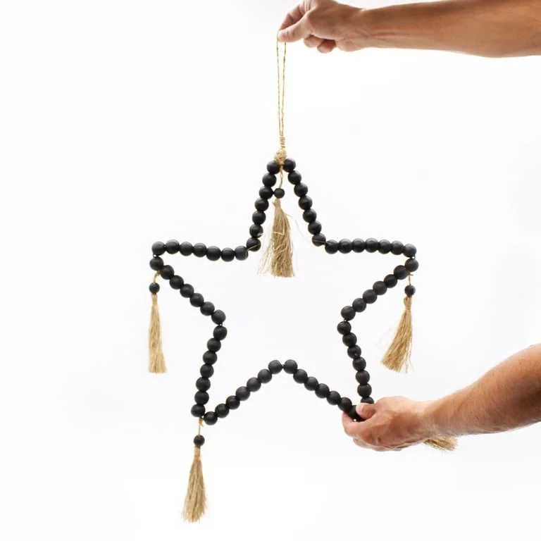 Large bead star shaped decor on a wooden square board, 58x38 cm