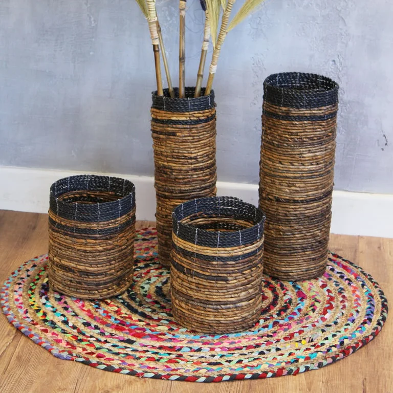 Banana leaf vase set featuring two vases and two matching bins.