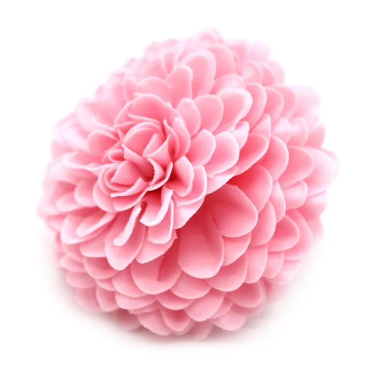 Light pink craft soap shaped like a small chrysanthemum flower.
