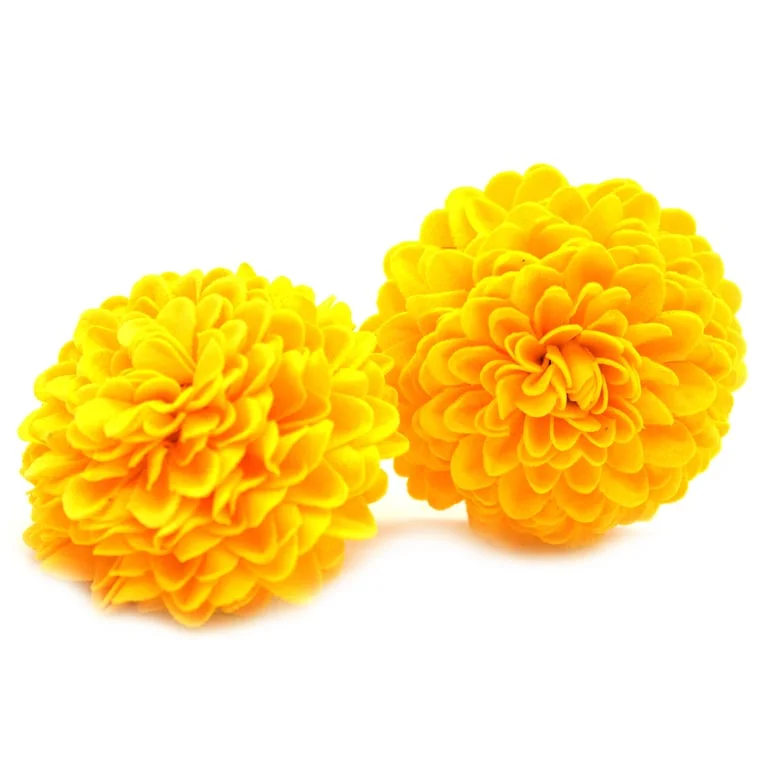 Yellow craft soap shaped like a small chrysanthemum soap with detailed floral design