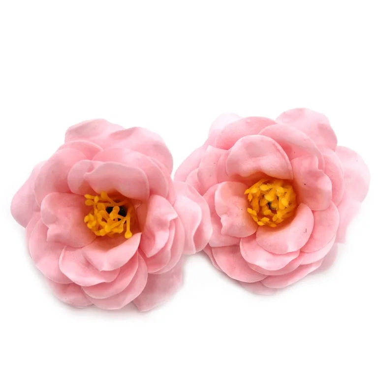 Light pink soap flower camellia crafted into a decorative soap