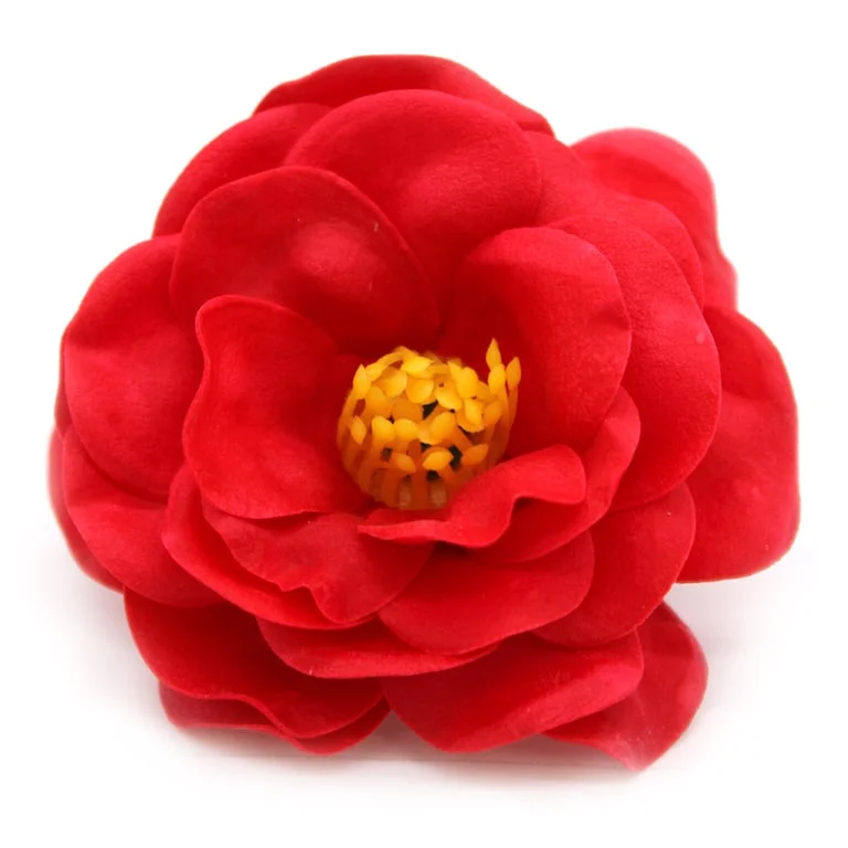 Red craft soap flower shaped like a camellia.