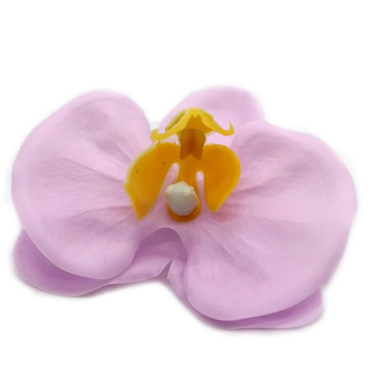 Purple craft soap flower depicting a paeonia blossom.