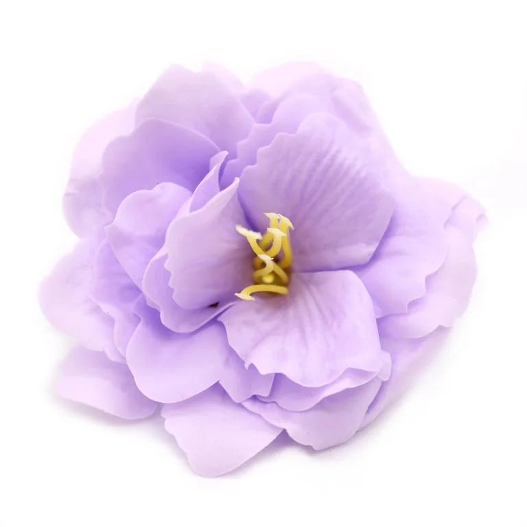 Purple craft soap flower shaped like a small peony.