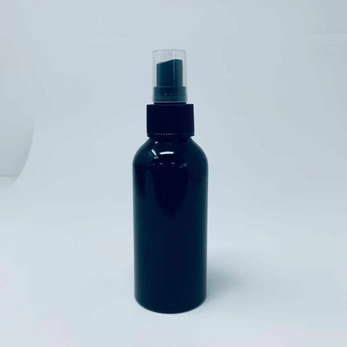 120ml black aluminium bottle with matching spray cap against a white background
