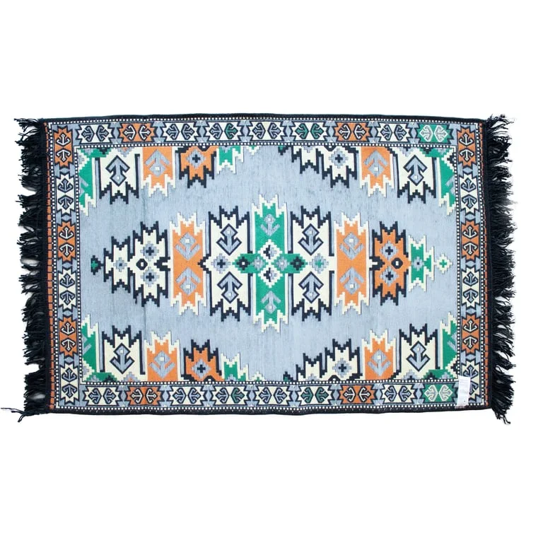 Charcoal kilim rug with woven geometric patterns in deep charcoal tones.