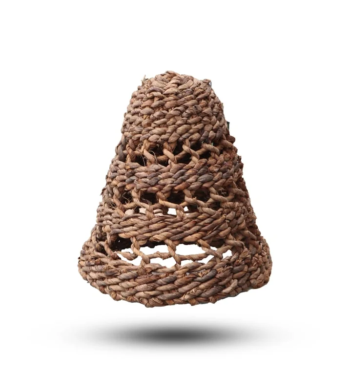 Three natural lamp shades made from banana leaves, arranged together, showcasing their organic leaf design.