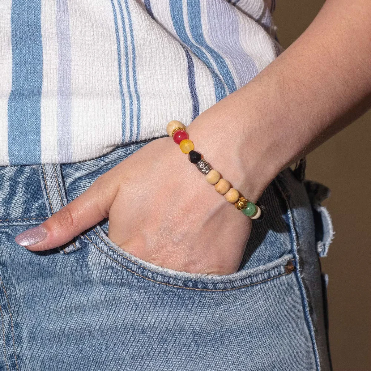 Tri Hita Karana Bangle in gold tone, symbolizing love, a unique friendship bracelet with elegant design