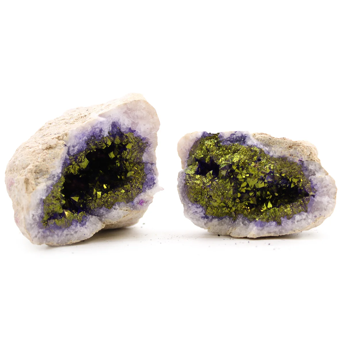 Purple and gold geodes showing natural rock formations with vibrant crystal interiors on a white background