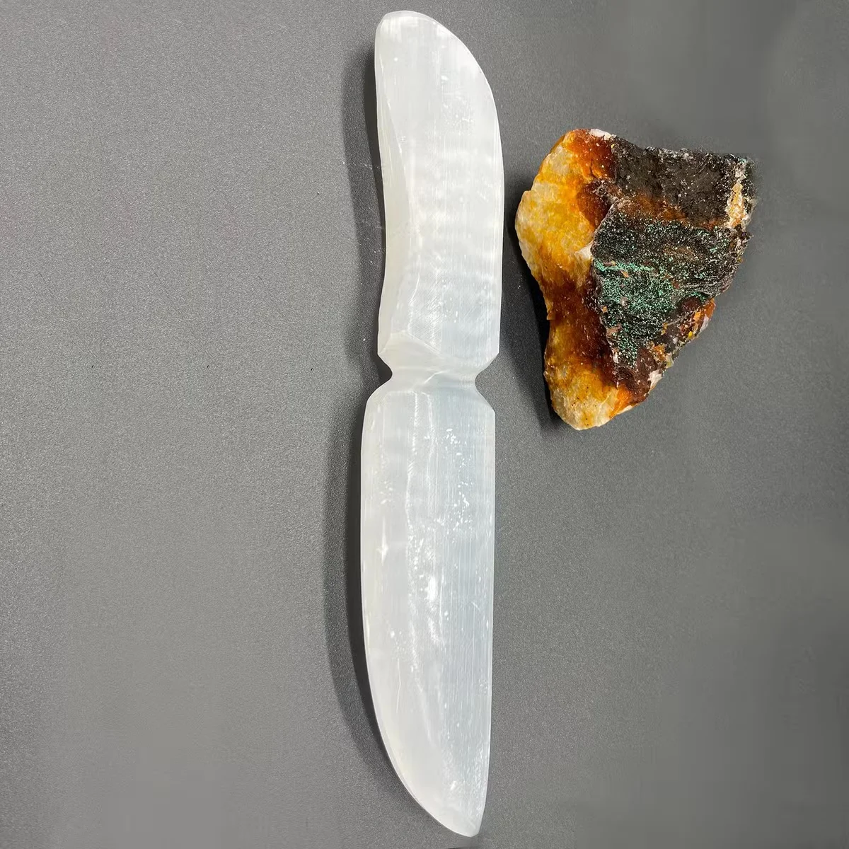 Classic selenite ritual knife shown as a ceremonial ritual tool with smooth white translucent blade and handle