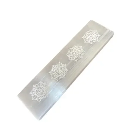 Flat bar charging plate 15cm with intricate mandala design in neutral tones on a smooth surface