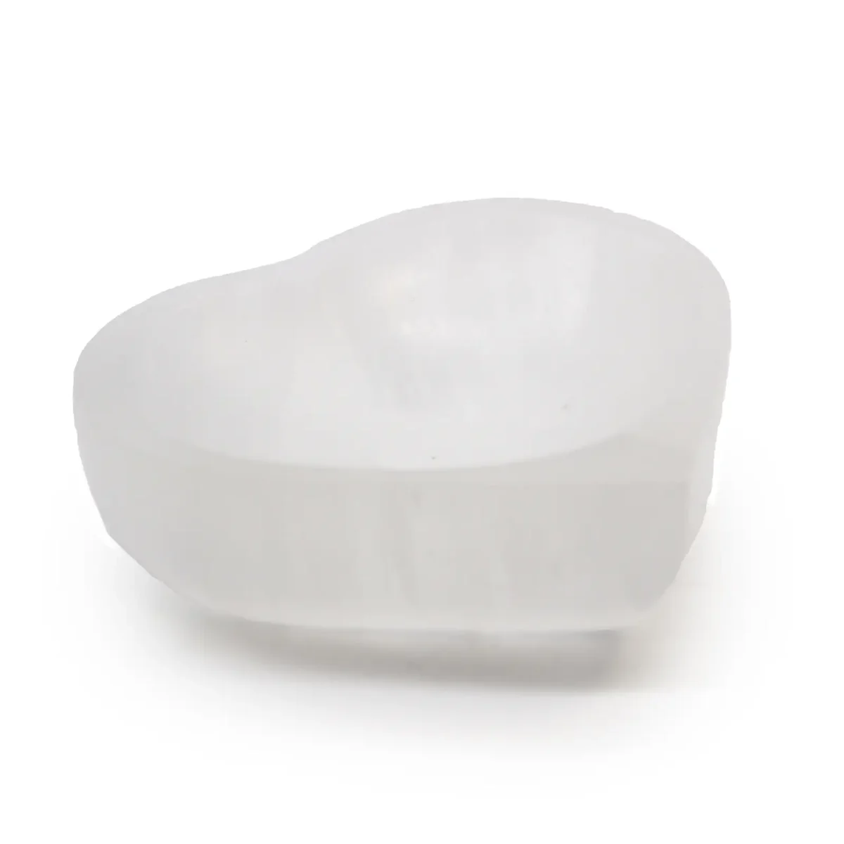 Heart shaped bowl made of white selenite crystal, measuring 10cm in diameter, smooth polished surface