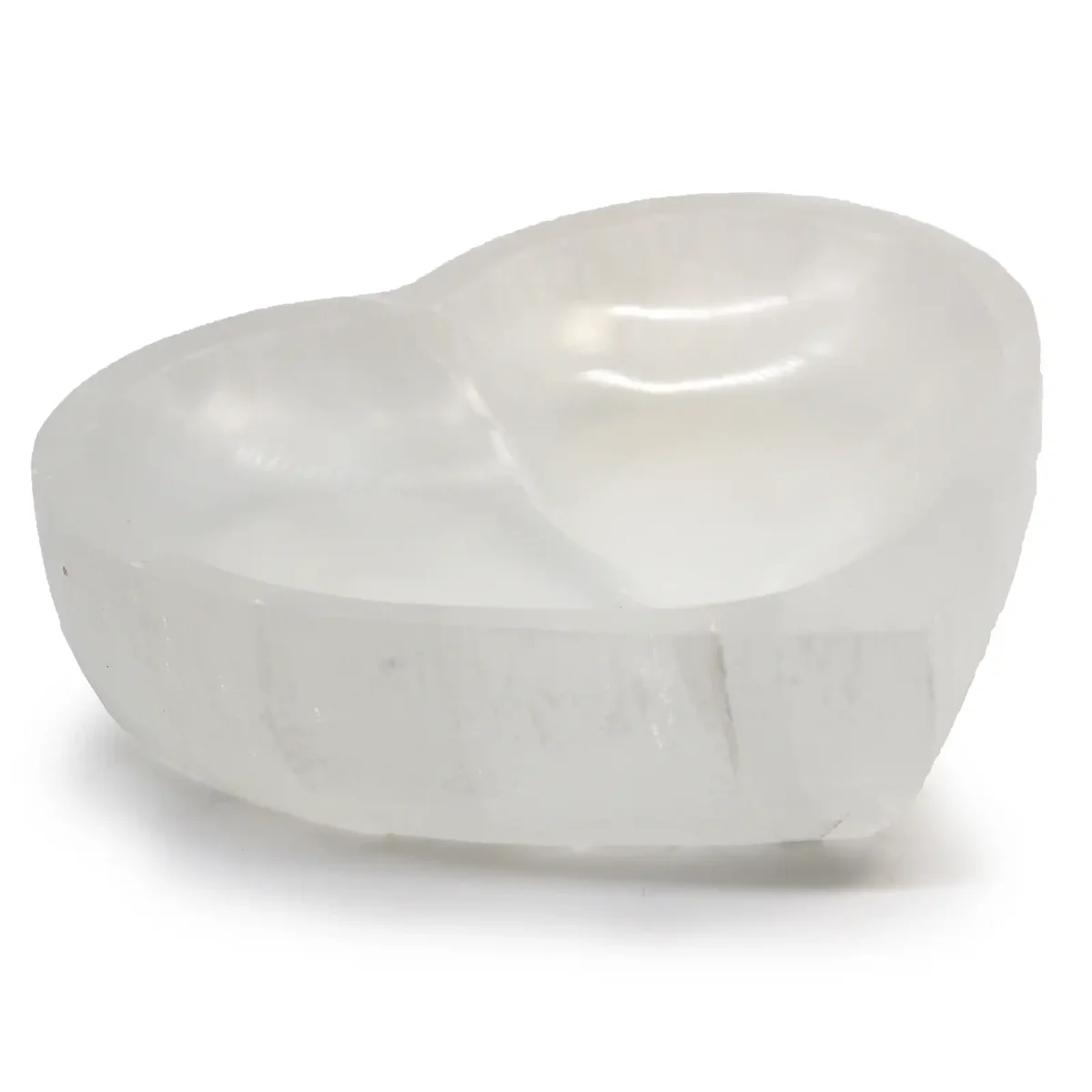 Heart-shaped 15cm selenite bowl with smooth, translucent white crystal surface on a plain background