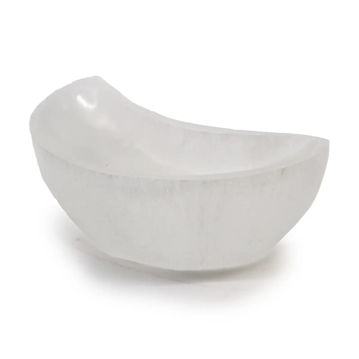 Smooth white selenite bowl shaped like a crescent moon, measuring 10cm in diameter on a white background