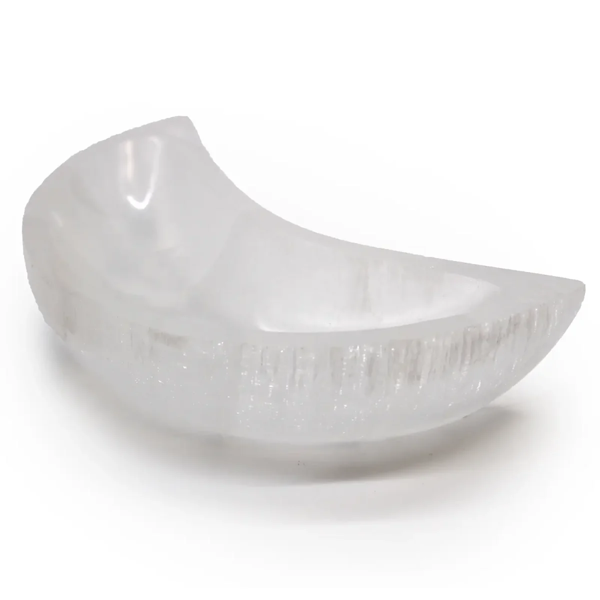 White selenite moon shaped bowl measuring 15cm with smooth, translucent surface on a plain background