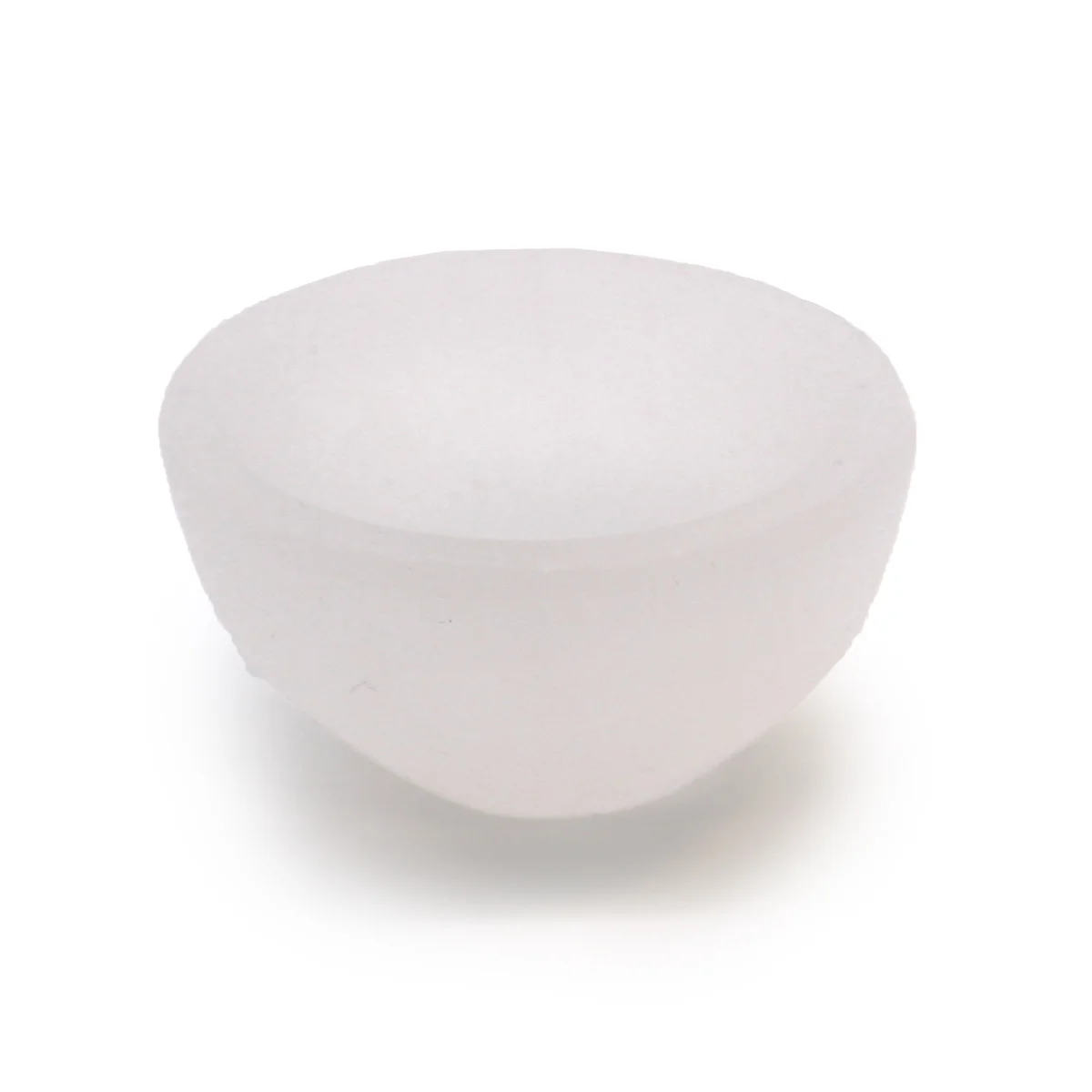 Smooth 6cm selenite bowl with a round shape and translucent white appearance on a plain background