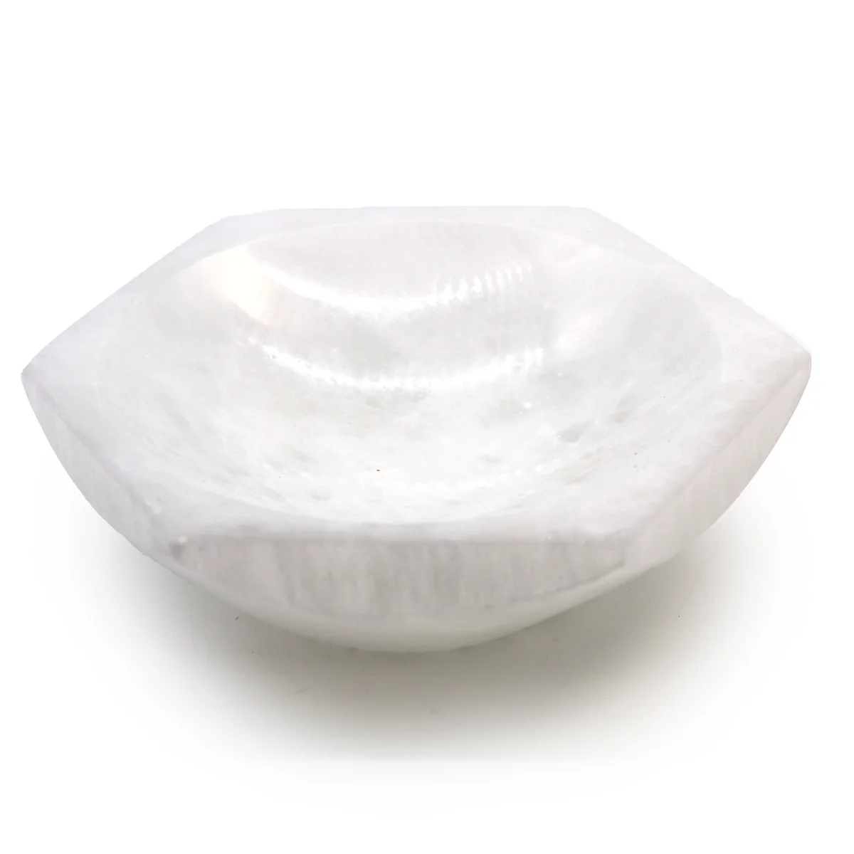 Selenite hexagonal crystal bowl measuring 15cm, showing smooth translucent white crystal with geometric facets