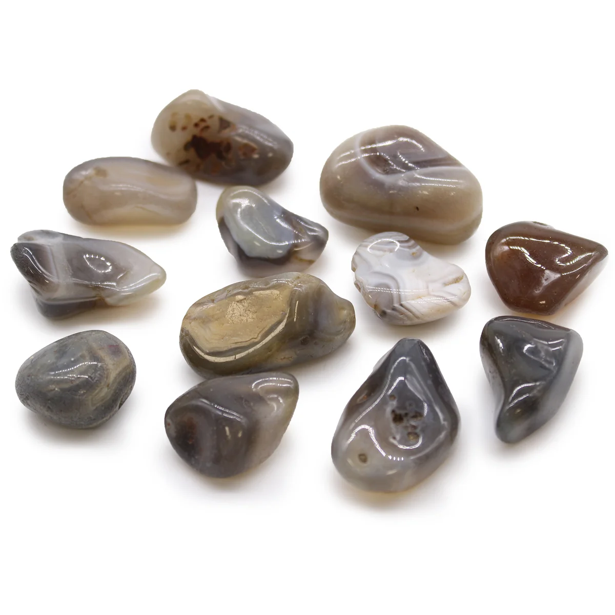 Medium grey agate stones from Botswana, smooth tumble stones with natural grey and white banding patterns
