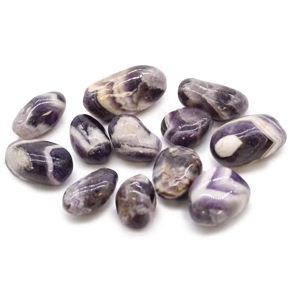 Medium polished African amethyst decor stones with chevron patterns in purple hues, ideal for display or collection