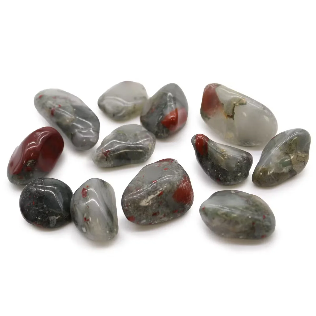 Medium polished Sephtonite stones in deep green and red hues, known as African Bloodstone tumble stones.