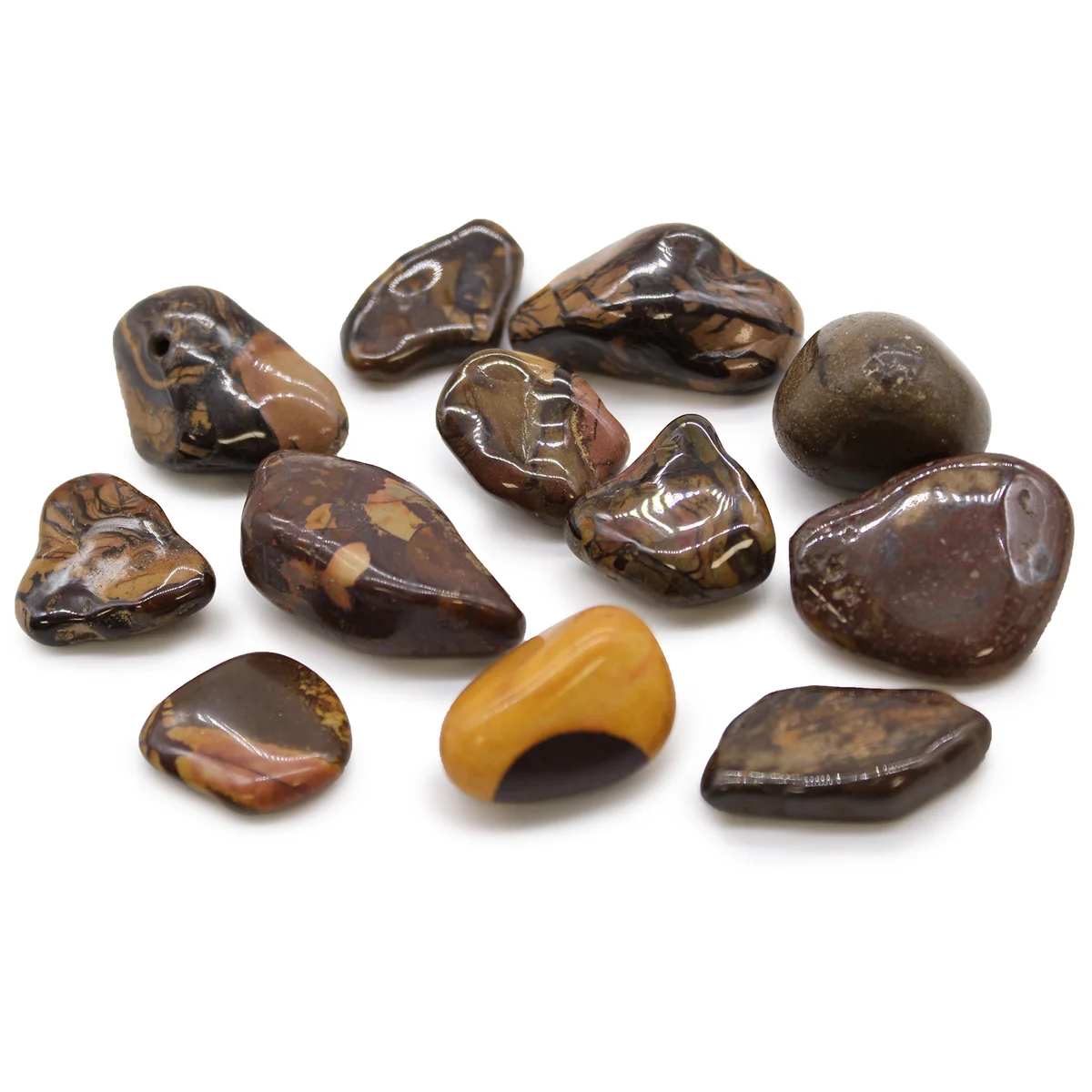 Medium-sized African Nguni picture stones with smooth tumble finish in natural earthy tones, set against plain background