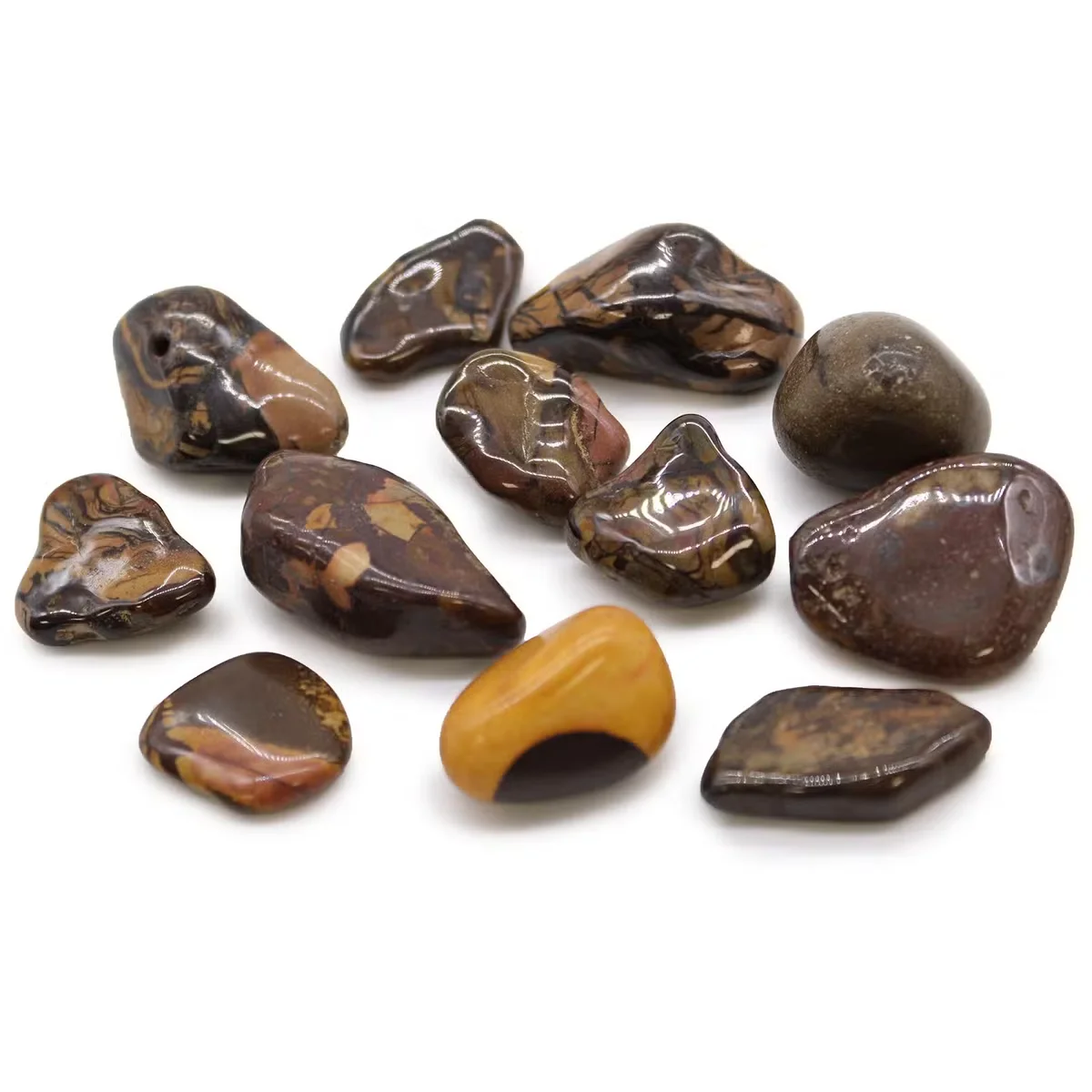 Medium African Picture Nguni decorative tumble stones in various natural colors and smooth textures, arranged closely together