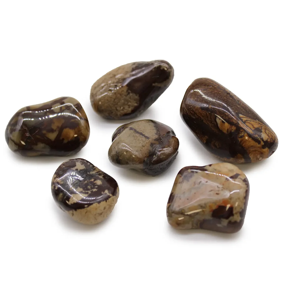 Large polished Jasper Nguni stones in earthy tones, showcasing smooth, rounded shapes and natural patterns