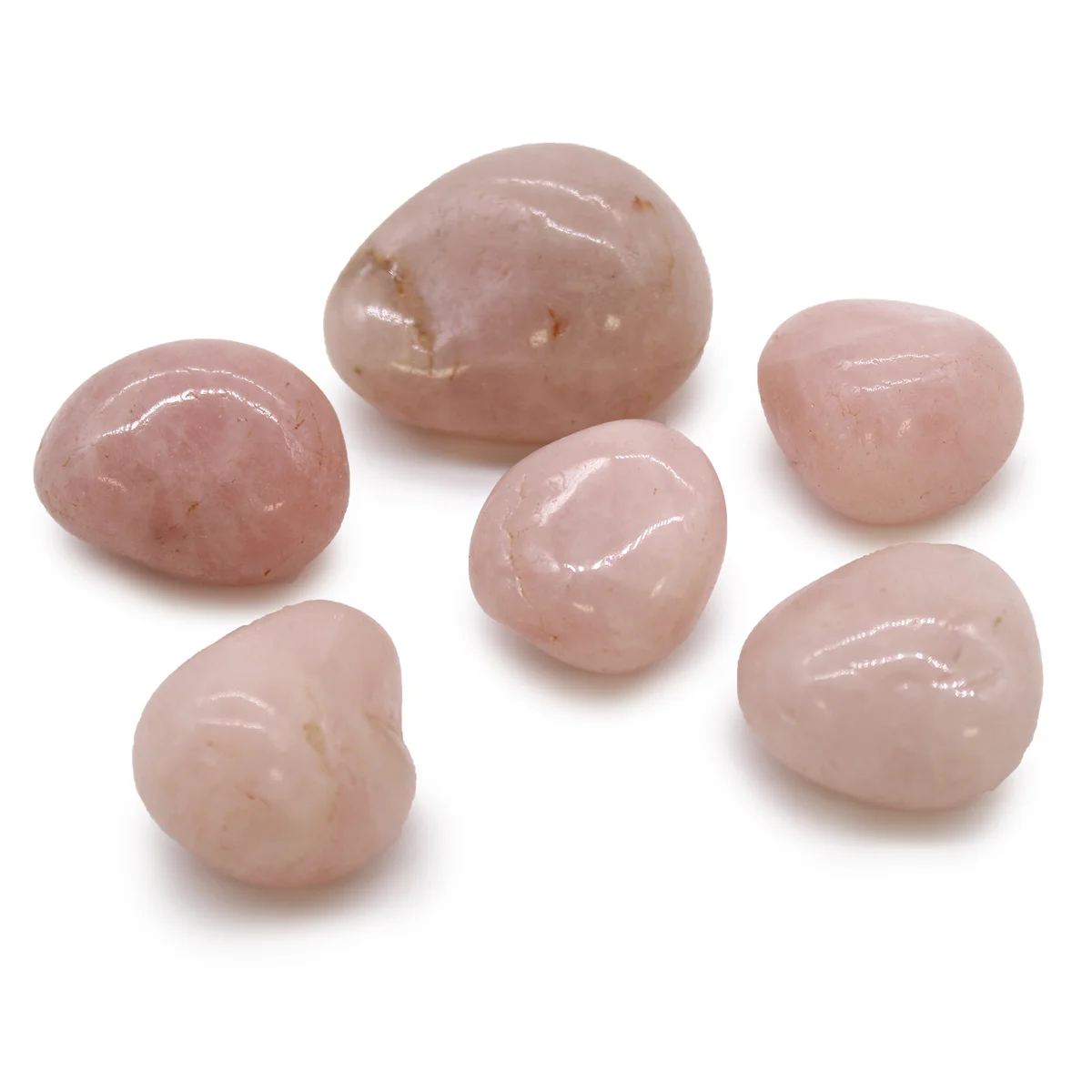 Large rose quartz African tumble stones with natural sloped surfaces, shown against a light‑colored background