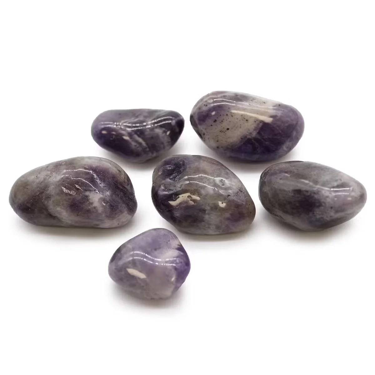 Large purple amethyst decorative tumble stones from Africa with smooth polished surfaces for display or collection