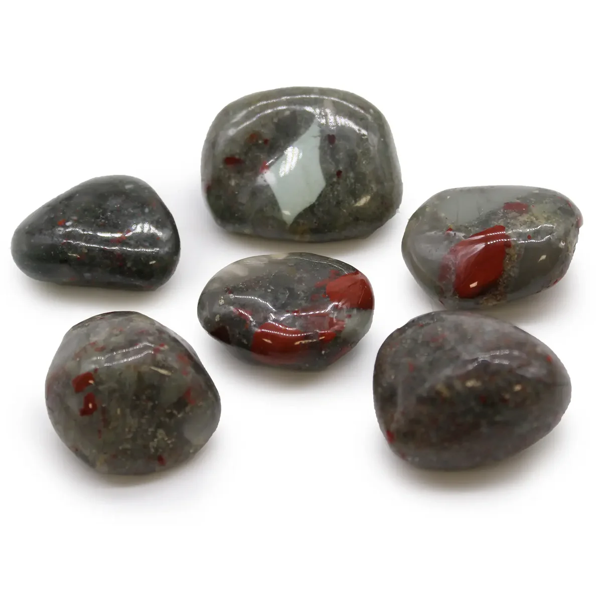 Large African tumble stones, dark green bloodstone with orange veins, a collection of rounded stones.