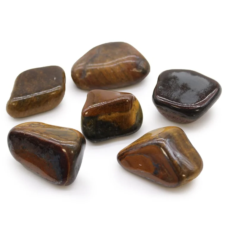 Large African tumbled tiger eye stone with variegated pattern and natural surface texture.