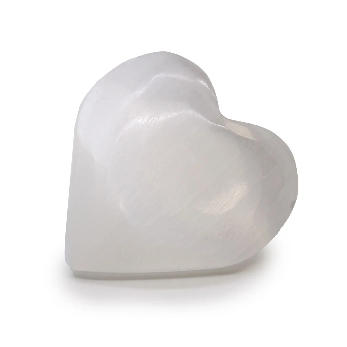 Polished selenite heart ornament measuring 7-8cm with smooth, translucent white surface on plain background
