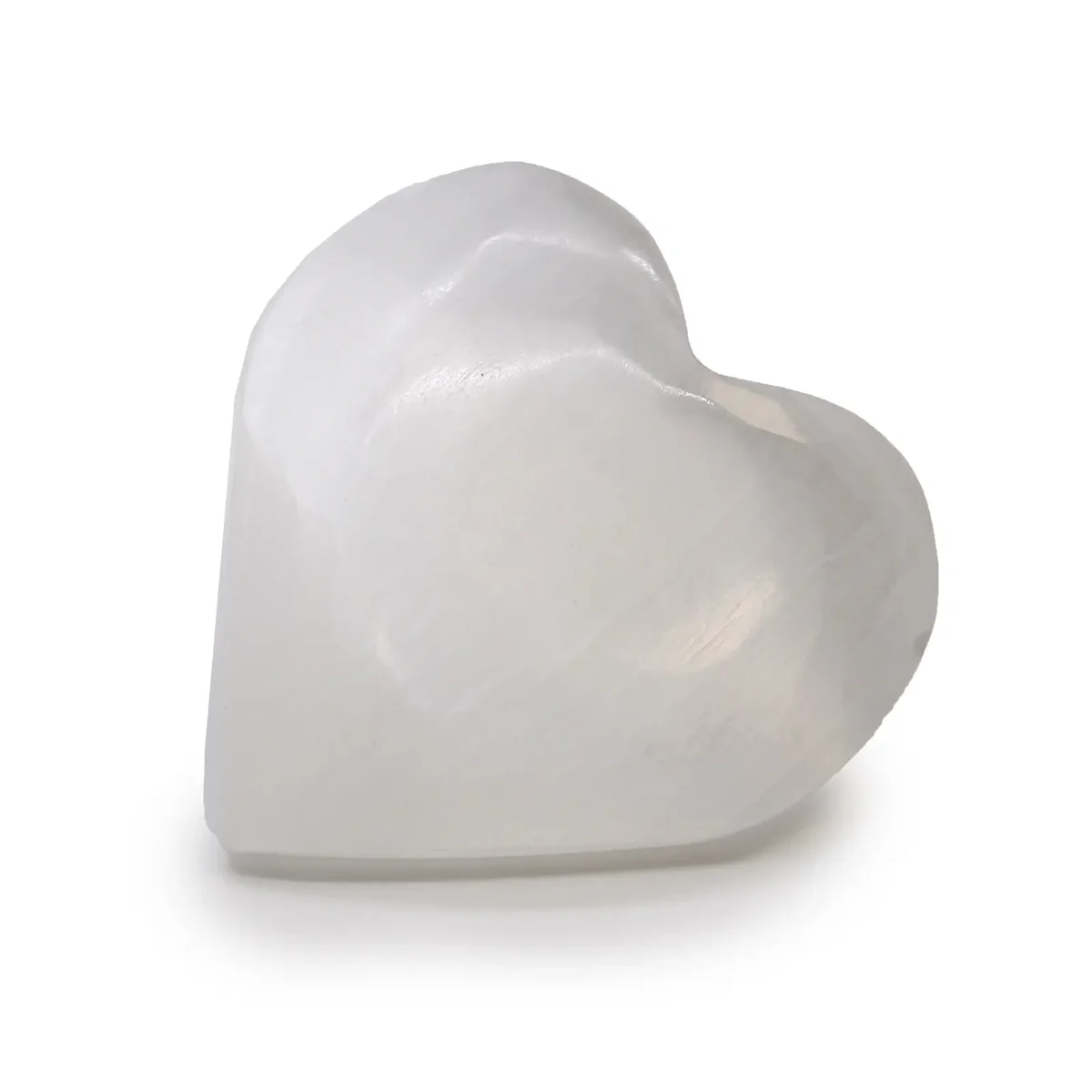 Polished selenite crystal heart measuring 7-8cm with smooth, translucent white surface on plain background