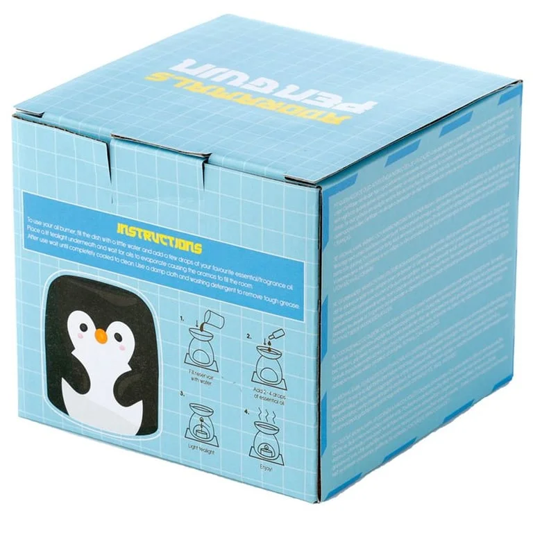 Penguin-shaped ceramic oil burner, a whimsical oil burner home decor piece for the living room.