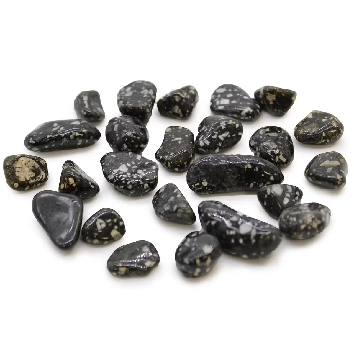Small African decor stones featuring guinea fowl patterns in a tumble stone shape, ideal for decorative use