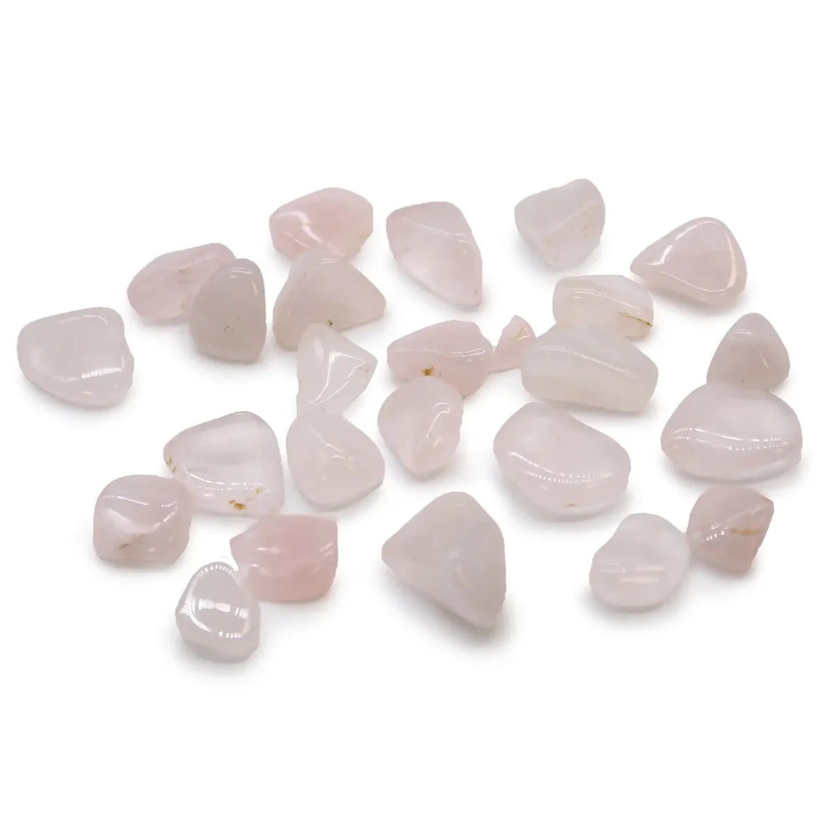 Small polished rose quartz African tumble stones in soft pink hues arranged on a white background