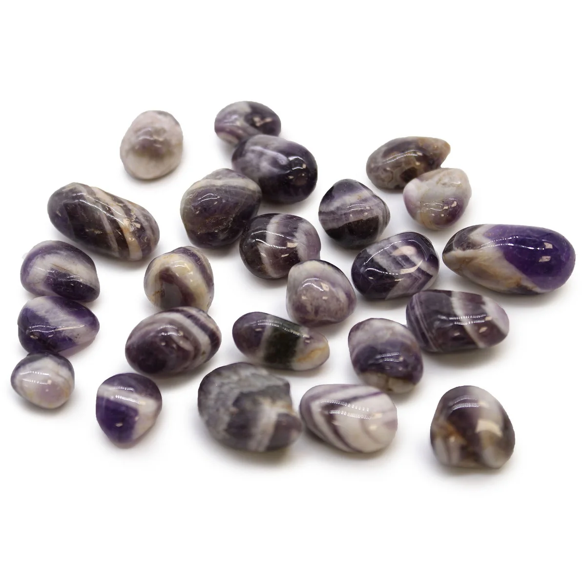 Small polished African amethyst tumble stones with distinctive chevron patterns in purple hues on white background