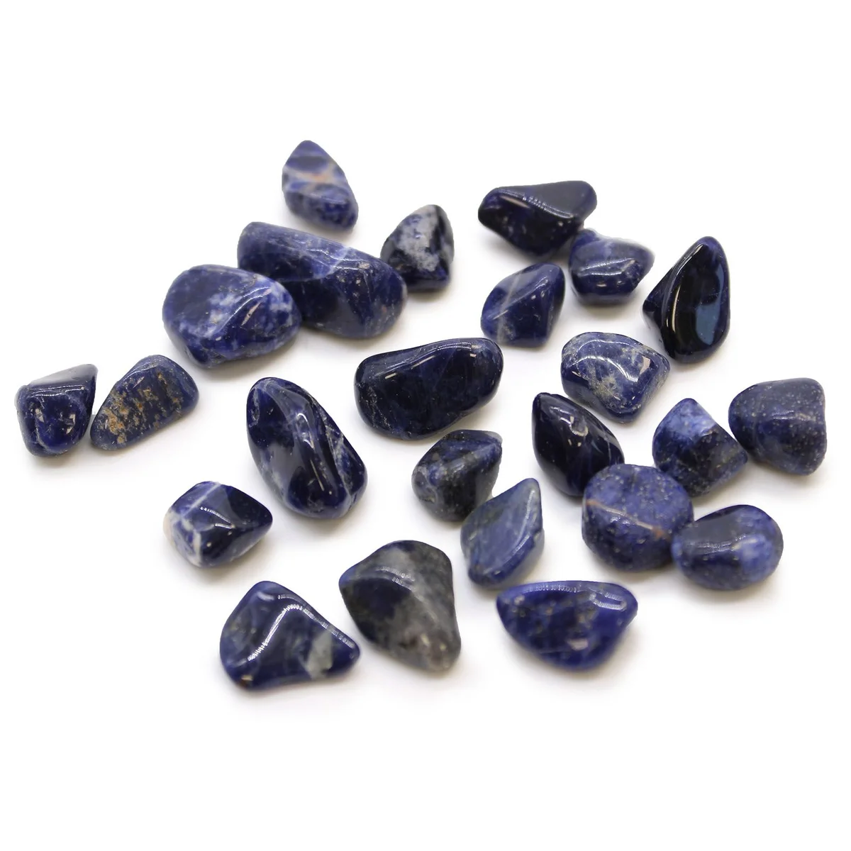 Small sodalite stones in pure blue, polished and tumbled, from Africa, displayed on a white background