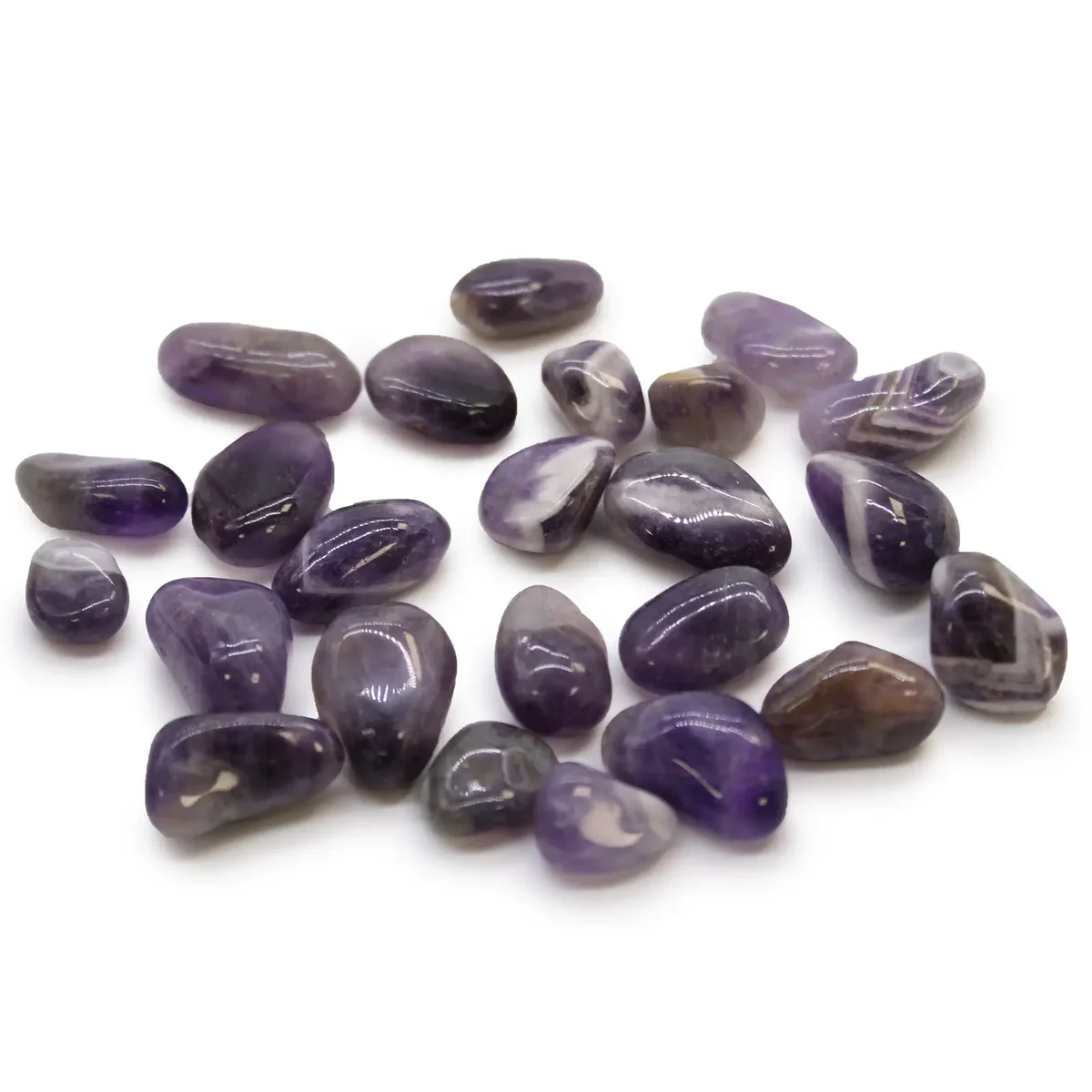 Small polished African amethyst stones in various purple shades, smooth tumble stones for collection or decoration