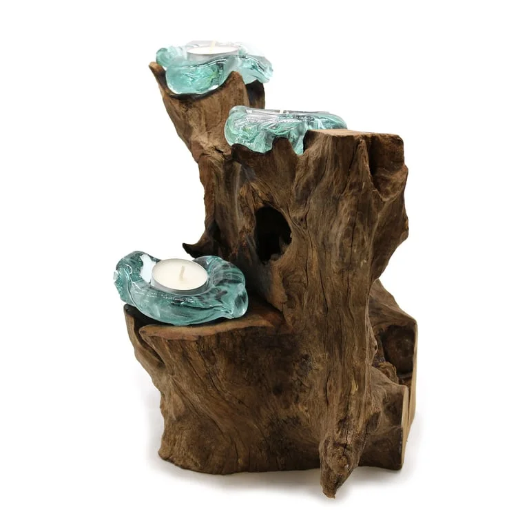 Molton candle holder with three glass candles on a wooden base, a stylish home décor accent.