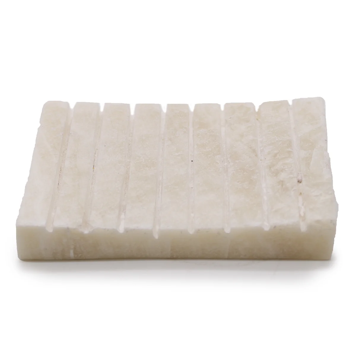 White Onxy ridged soap dish with raised ridges, a stylish bathroom soap holder.