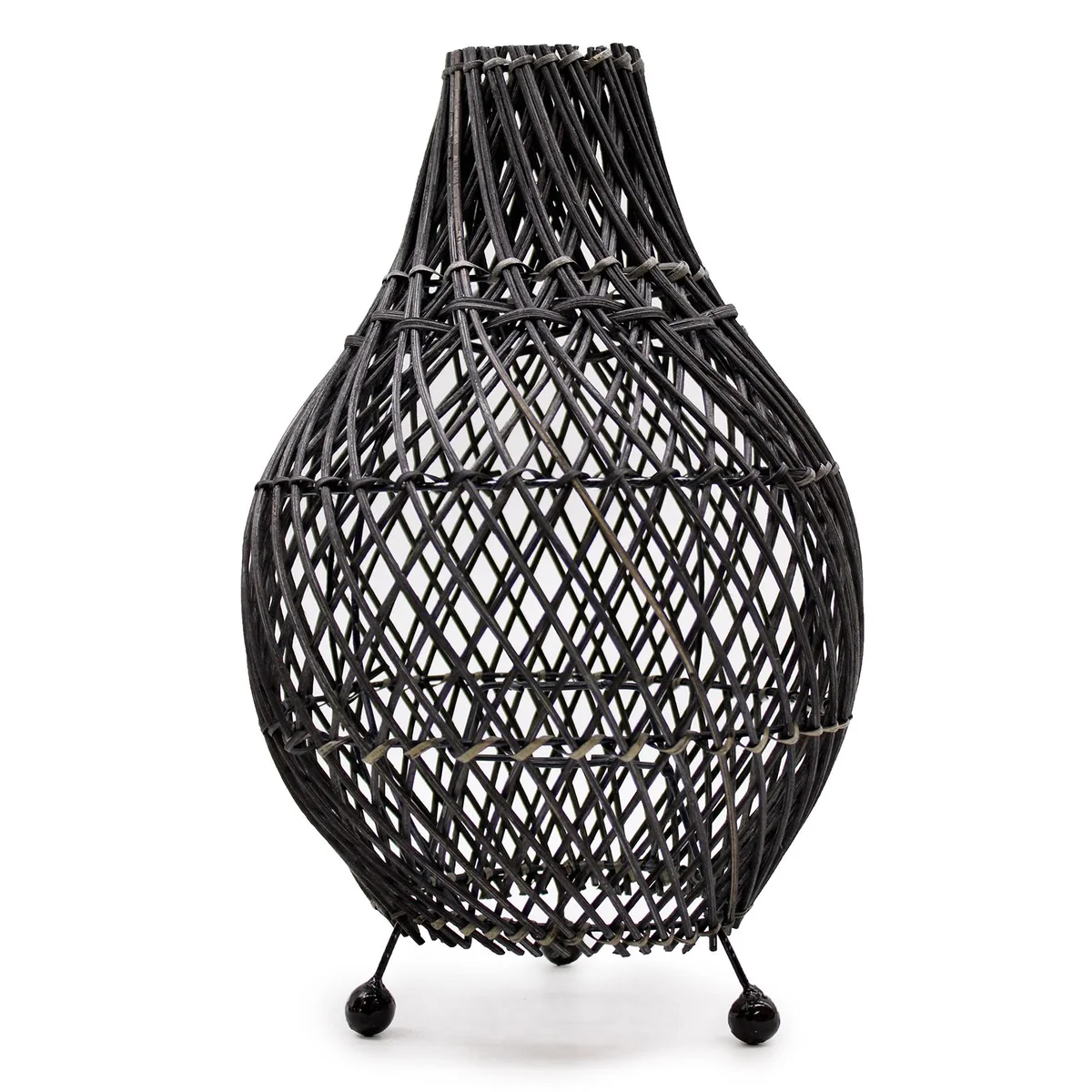 Black rattan table lamp with woven base.